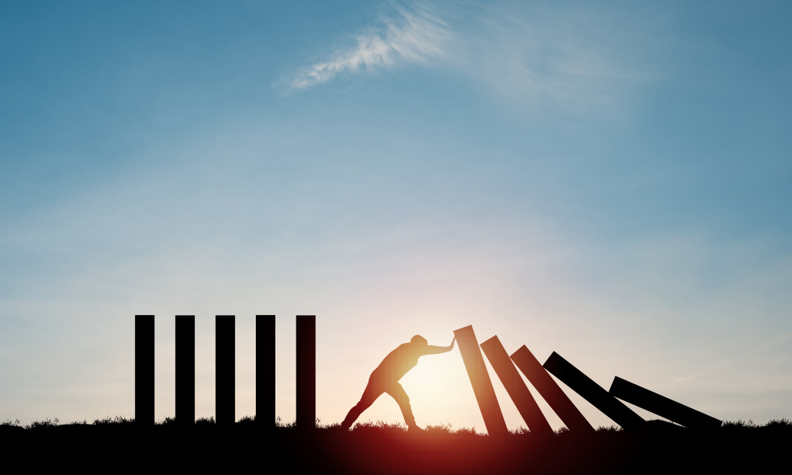 Dominoeffekt, risiko. Foto: Shutterstock