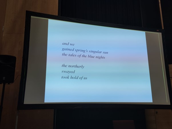 Image of a conference slide showing an excerpt from a poem by Sámi poet Nils-Aslak Valkeapää:
and we
gained spring's singular sun
the tales of the blue nights
the northerly
swayed
tool hold of us